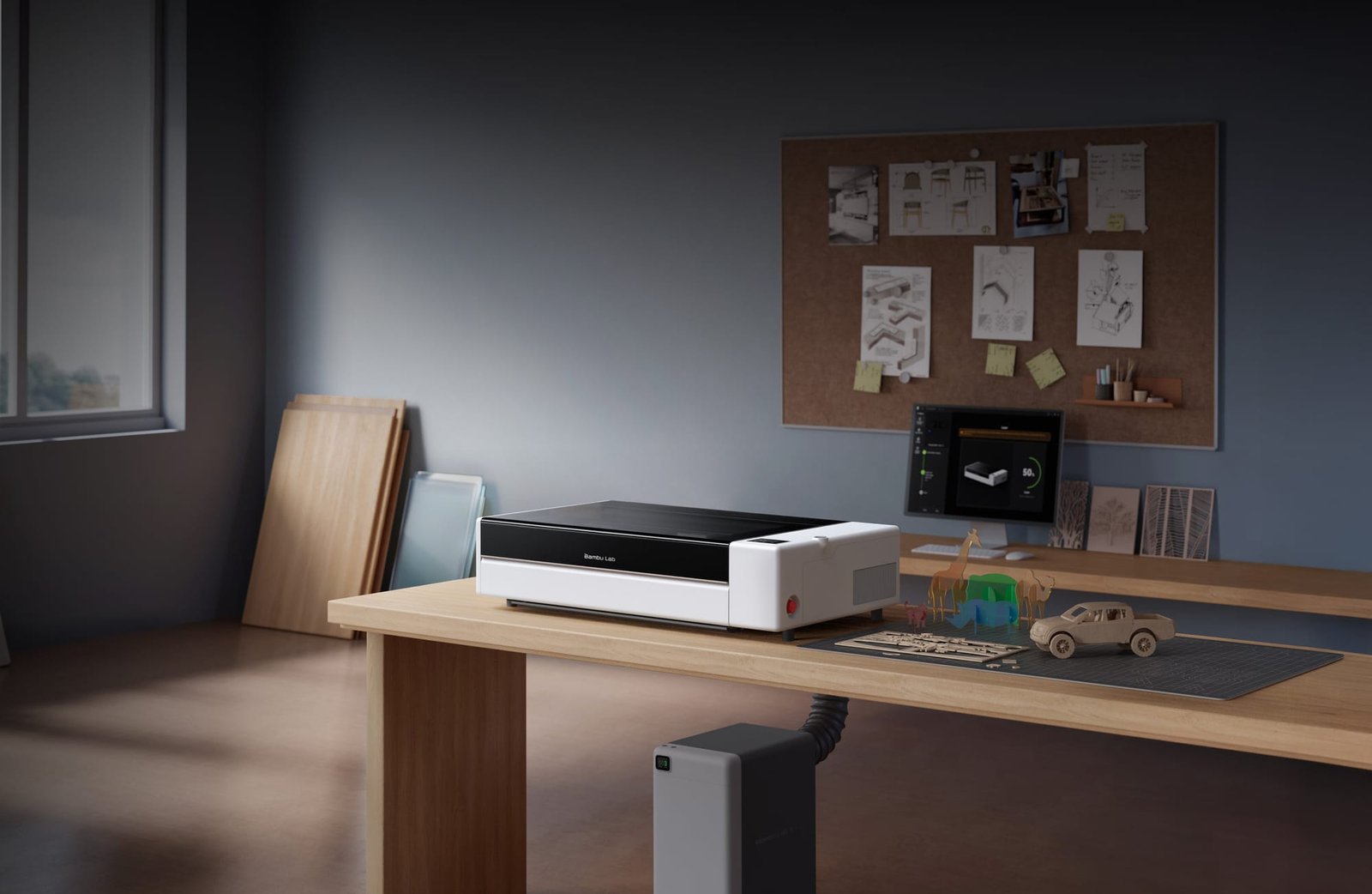 Bambu Lab R1 — uma cortadora a laser CO₂ de mesa em uma bancada